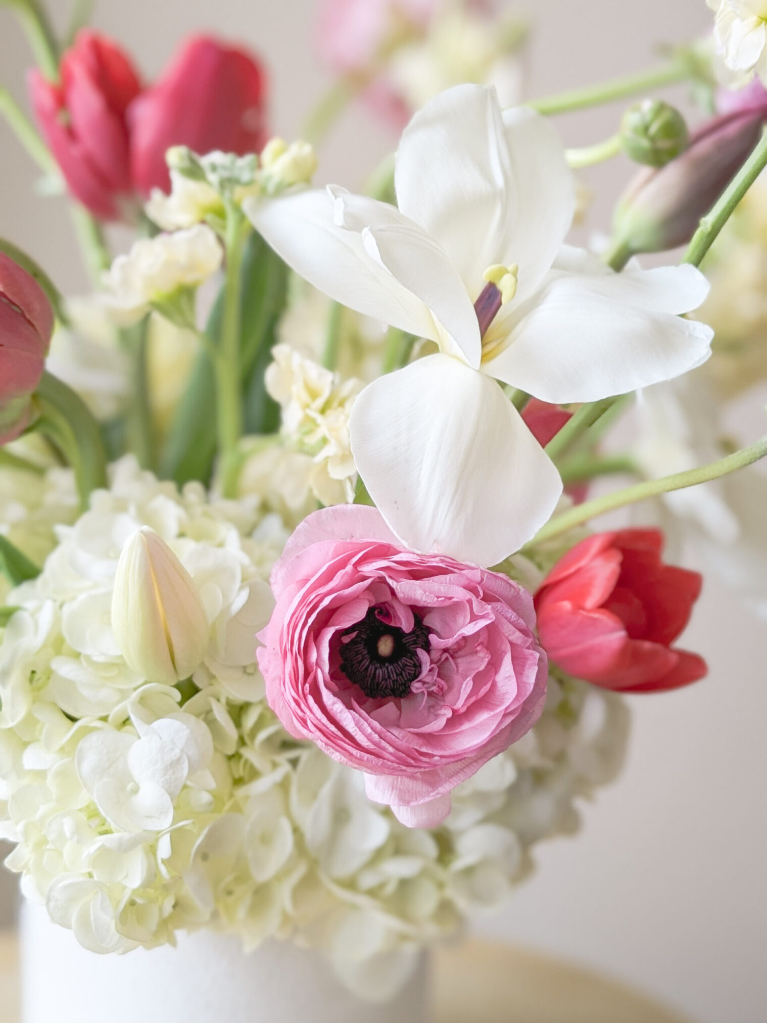 Locally grown flowers in a vase arrangement.
